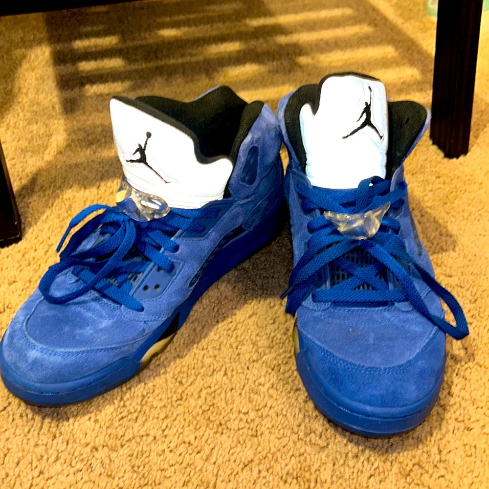 Used blue Jordan 5s selling as is.